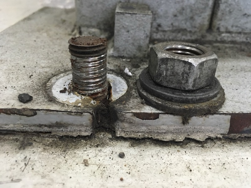 Stripped concrete anchor